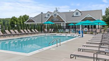 Outdoor pool with tanning ledge